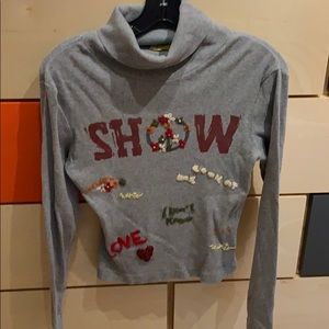 Cotton turtleneck with hand stitched Peace & love